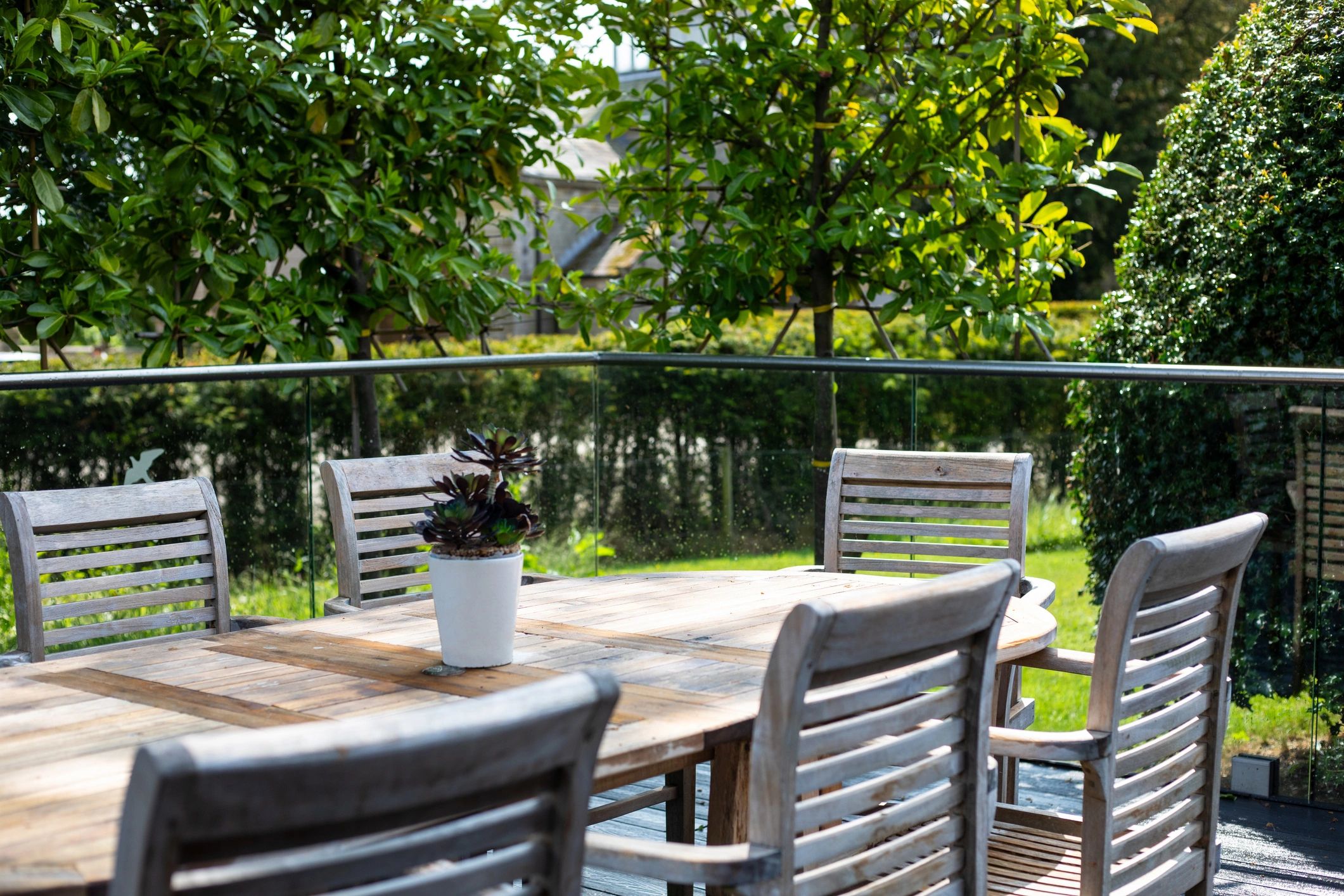 Outdoor seating area with shade and weather protection